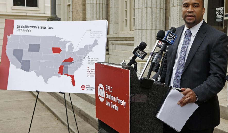 Jody Owens, of the Southern Poverty Law Center, says Mississippi's system is "harsh, punitive and unforgiving" and disproportionately hurts African-Americans, during a Tuesday, March 27, 2018, news conference in Jackson, Miss., where the center announced their new federal lawsuit challenging the limited way Mississippi restores voting rights to ex-convicts who complete their sentences. (AP Photo/Rogelio V. Solis)