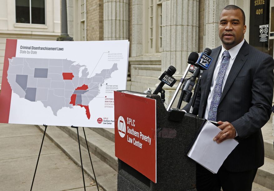 Jody Owens, of the Southern Poverty Law Center, says Mississippi's system is "harsh, punitive and unforgiving" and disproportionately hurts African-Americans, during a Tuesday, March 27, 2018, news conference in Jackson, Miss., where the center announced their new federal lawsuit challenging the limited way Mississippi restores voting rights to ex-convicts who complete their sentences. (AP Photo/Rogelio V. Solis)