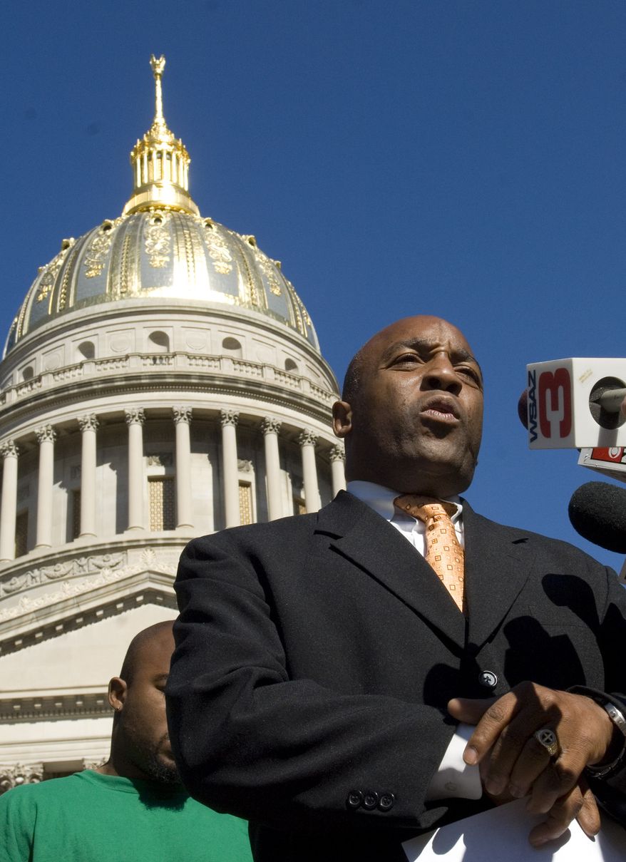 The Rev. Kenneth Glasgow of The Ordinary People Society addresses the media in front of the West Virginia State Capitol in Charleston, W.Va., Monday, Oct. 29, 2007 concerning a planned hate crimes rally prompted by the rape case of a young black woman in September. (AP Photo/Bob Bird)