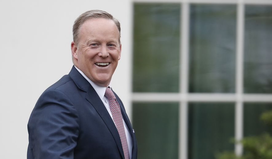 Outgoing White House press secretary Sean Spicer smiles as he departs the White House, Friday, July 21, 2017, in Washington. (AP Photo/Alex Brandon) ** FILE **