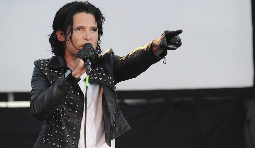 FILE - In this May 25, 2013, file photo, Corey Feldman performs in Los Angeles. Feldman was charged with possession of marijuana on Oct.  21, 2017, in Mangham, Louisiana, after being pulled over for speeding.  Feldman said the marijuana wasn&#39;t his, but was a medicinal drug for a member of his touring crew. Feldman is on tour with his band, The Angels. (Photo by Katy Winn/Invision/AP, File)