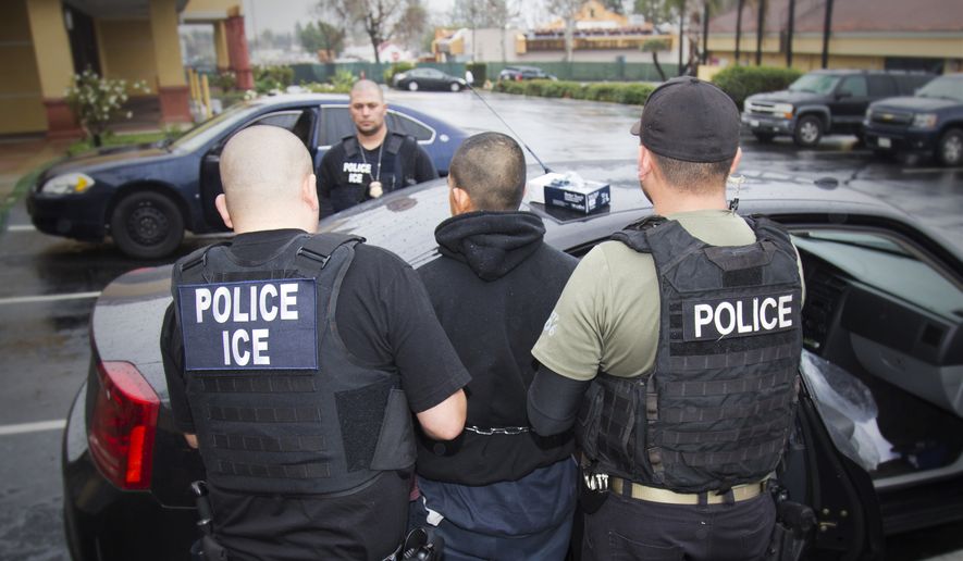 In this Feb. 7, 2017, photo released by U.S. Immigration and Customs Enforcement, foreign nationals are arrested during a targeted enforcement operation conducted by U.S. Immigration and Customs Enforcement (ICE) aimed at immigration fugitives, re-entrants and at-large criminal aliens in Los Angeles. (Charles Reed/U.S. Immigration and Customs Enforcement via AP, File)