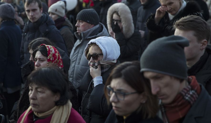 Mourners in Russia brought flowers, toys and candles for the victims of Sunday&#x27;s fire in a shopping mall in the far-away Siberian city of Kemerovo. (Associated Press)