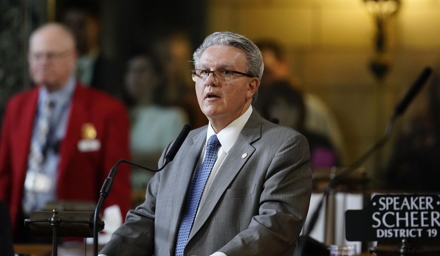 Nebraska Speaker of the Legislature Jim Scheer of Norfolk announces a delay in the budget debate at the Legislature in Lincoln, Neb., Wednesday, March 28, 2018. A dispute over abortion has led to a budget standoff in Nebraska that could disrupt other state services and force lawmakers into a rare special session later this year. Nebraska's state finances fell into limbo after lawmakers failed twice to advance a wide-ranging budget bill because of a dispute over health clinics that refer women to abortion providers. (AP Photo/Nati Harnik)