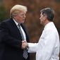 FILE - In this Friday, Jan. 12, 2018 file photo, President Donald Trump shakes hands with White House physician Dr. Ronny Jackson as he boards Marine One to leave Walter Reed National Military Medical Center in Bethesda, Md., after his first medical check-up as president. On Wednesday, March 28, 2018, President Donald Trump fired Veterans Affairs Secretary David Shulkin, and tweeted that Jackson is his nominee to replace Shulkin. (AP Photo/Carolyn Kaster)