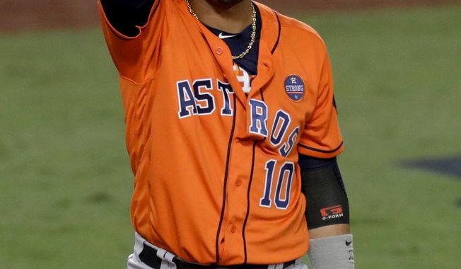 FILE - In this Nov. 1, 2017, file photo, Houston Astros&#x27; Yuli Gurriel reacts after striking out against the Los Angeles Dodgers during the third inning of Game 7 of baseball&#x27;s World Series in Los Angeles. Gurriel has started the season on baseball’s restricted list to serve his five-game suspension from the World Series rather than on the disabled list after hand surgery last month. Gurriel was suspended after making an inappropriate gesture during Game 3 of the World Series after hitting a homer off Los Angeles Dodgers pitcher Yu Darvish, who is from Japan. (AP Photo/Alex Gallardo, File)