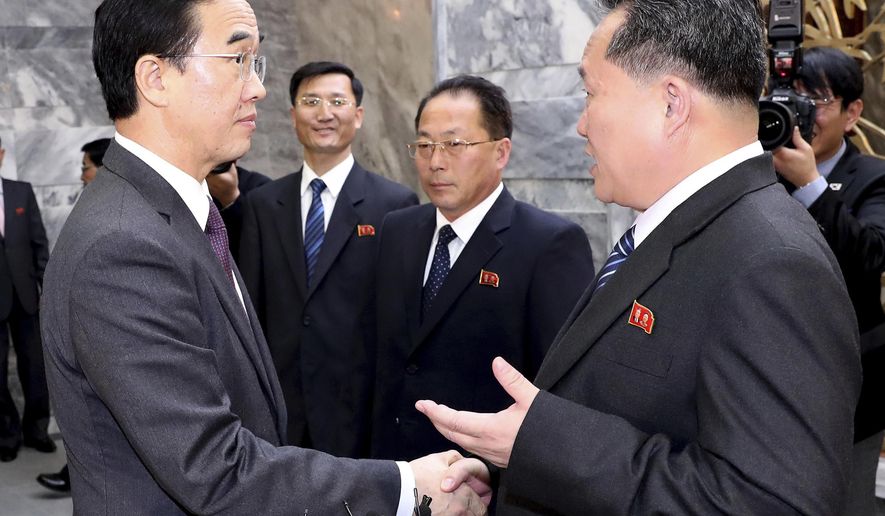 South Korean Unification Minister Cho Myoung-gyon, left, shakes hands with North Korean delegation head Ri Son Gwon after their meeting at the northern side of the Panmunjom Thursday, March 29, 2018. North Korean leader Kim Jong Un will meet South Korean President Moon Jae-in at a border village on April 27, the South announced Thursday after the nations agreed on a rare summit that could prove significant in global efforts to resolve a decades-long standoff over the North&#39;s nuclear program. (Korea Pool Photo via AP)
