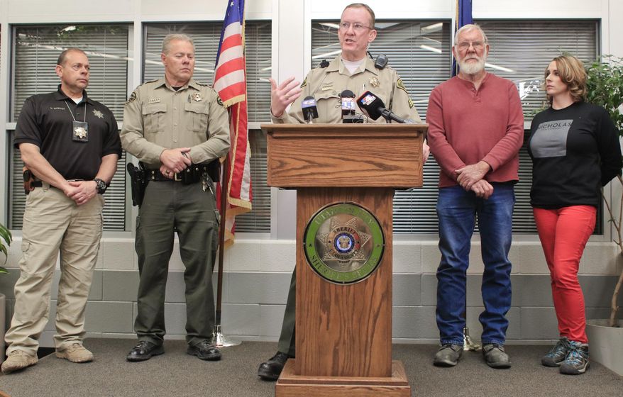 Sgt. Spencer Cannon, public information officer for Utah County Sheriff's office, answers questions at the end of the press conference at the Utah County Sheriff's office on Thursday, March 29, 2018, in Spanish Fork, Utah. (Evan Cobb/The Daily Herald via AP)