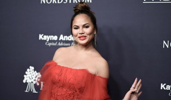 Chrissy Teigen attends the 6th Annual Baby2Baby Gala honoring Gwyneth Paltrow in Culver City, California, Nov. 11, 2017. Teigen, famous for her unfiltered comments on social media, spoke to the Associated Press, Friday, March 30, 2018, to promote her creative consultant role with Pampers, and her singer husband John Legend&#39;s upcoming live performance in &amp;quot;Jesus Christ Superstar Live&amp;quot; on NBC. (Photo by Richard Shotwell/Invision/AP) ** FILE ** 