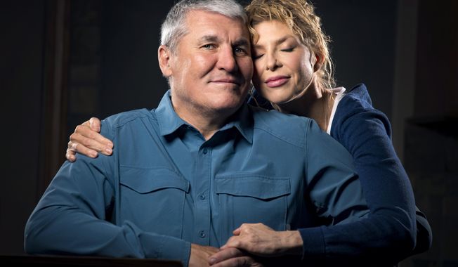 In this Monday March 26, 2018 photo, former Super Bowl MVP and Shadle Park High graduate Mark Rypien poses with his wife Danielle, in Spokane, Wash. With the help of his wife Rypien is dealing with a traumatic brain injury caused by the many concussions he received during his football career. (Colin Mulvany /The Spokesman-Review via AP) ** FILE **