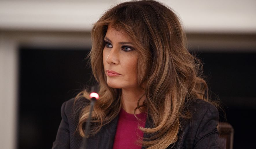 First lady Melania Trump listens during a roundtable on cyberbullying in the State Dining Room of the White House, Tuesday, March 20, 2018, in Washington. (AP Photo/Evan Vucci)