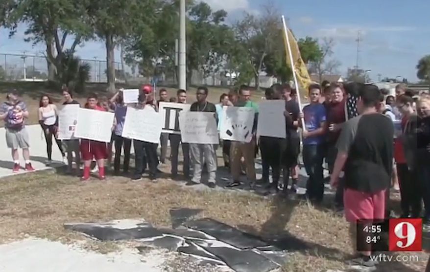 Dozens of students at Rockledge High School in Brevard County, Florida, walked out of classes Friday in support of the Second Amendment. (WFTV)