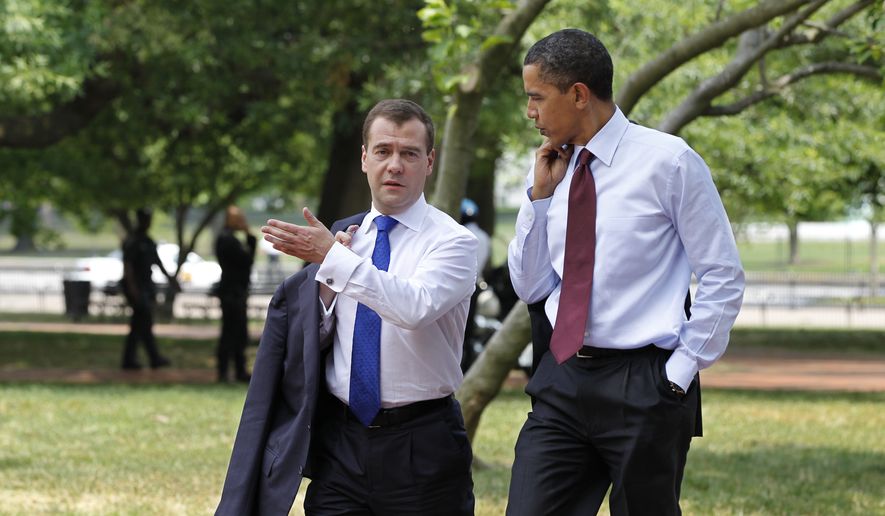 FILE - In this June 24, 2010, file photo, President Barack Obama and Russian President Dmitry Medvedev walk through Lafayette Park from the White House to a attend a meeting at the U.S. Chamber of Commerce in Washington. The Trump administration opened the door to a potential White House meeting between President Donald Trump and Russian President Vladimir Putin, raising the possibility of an Oval Office welcome for Putin for the first time in more than a decade even as relations between the two powers have deteriorated.(AP Photo/J. Scott Applewhite, File) **FILE**