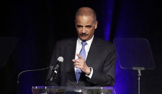 In this file photo, former Attorney General Eric Holder speaks at the Peabody Hotel Monday, April 2, 2018, in Memphis, Tenn. (AP Photo/Mark Humphrey) ** FILE **