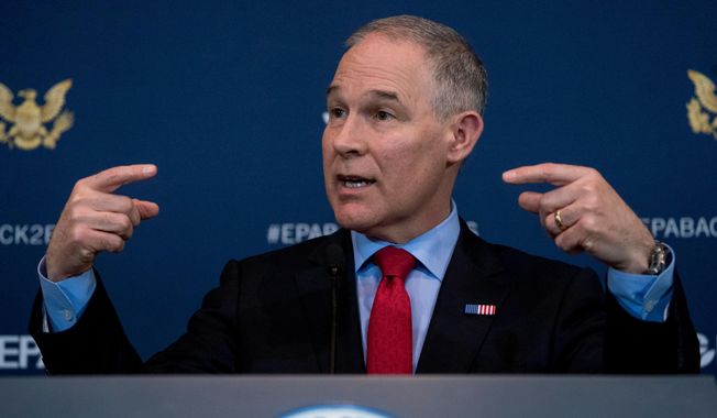 In this April 3, 2018, file photo Environmental Protection Agency Administrator Scott Pruitt speaks at a news conference at the Environmental Protection Agency in Washington. (AP Photo/Andrew Harnik,File)