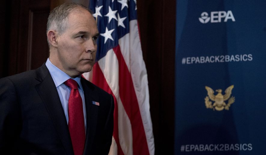 Environmental Protection Agency Administrator Scott Pruitt attends a news conference at the Environmental Protection Agency in Washington, Tuesday, April 3, 2018, on his decision to scrap Obama administration fuel standards. (AP Photo/Andrew Harnik)