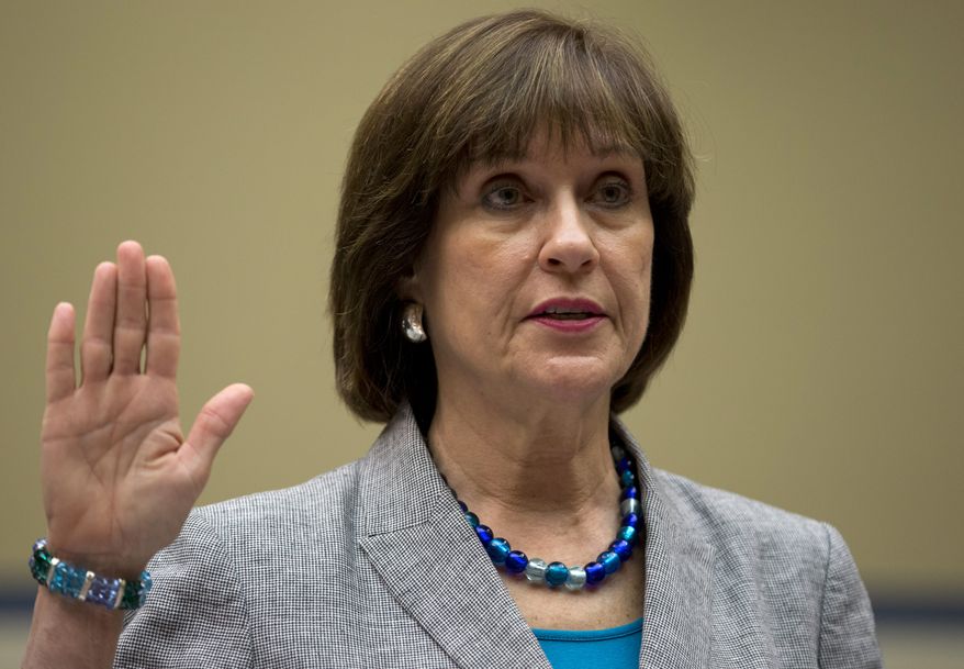 IRS official Lois Lerner is sworn in on Capitol Hill in Washington, Wednesday, May 22, 2013, before the House Oversight Committee hearing to investigate the extra scrutiny IRS gave to Tea Party and other conservative groups that applied for tax-exempt status. Lerner told the committee she did nothing wrong and then invoked her constitutional right to not answer lawmakers&#39; questions. (AP Photo/Carolyn Kaster)