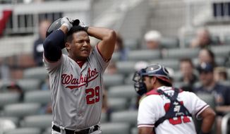 Washington Nationals&#39; Pedro Severino (29) reacts after striking out to end the National&#39;s half of the fourth inning of a baseball game against the Atlanta Braves Wednesday, April 4, 2018, in Atlanta. (AP Photo/John Bazemore)
