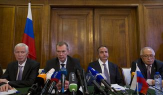 Russia&#x27;s ambassador Alexander Shulgin, center left, Deputy Minister of Industry and Trade Georgy Kalamanov, center right, and defense ministry experts Igor Rybalchenko, right, and Viktor Kholstov, left, address the media during a press conference at the Russian embassy in The Hague, Netherlands, Wednesday, April 4, 2018, following a special executive council of the Organisation for the Prohibition of Chemical Weapons (OPCW) which discussed the nerve agent attack on a former Russian spy and his daughter last month. (AP Photo/Peter Dejong)