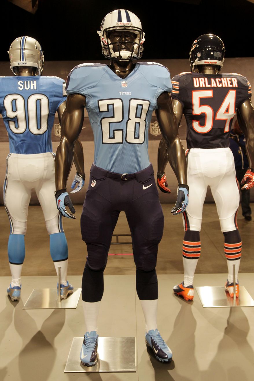 FILE - In this April 3, 2012 file photo, a Tennessee Titans uniform is displayed on a mannequin in New York. The Titans are unveiling the first major redesign of their uniforms in two decades Wednesday night, April 4, 2018. (AP Photo/Seth Wenig, File)