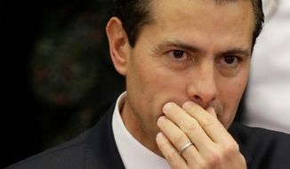 &quot;We will not allow negative rhetoric to define our actions,&quot; said Mexican President Enrique Pena Nieto in an address on Thursday. (Associated Press)