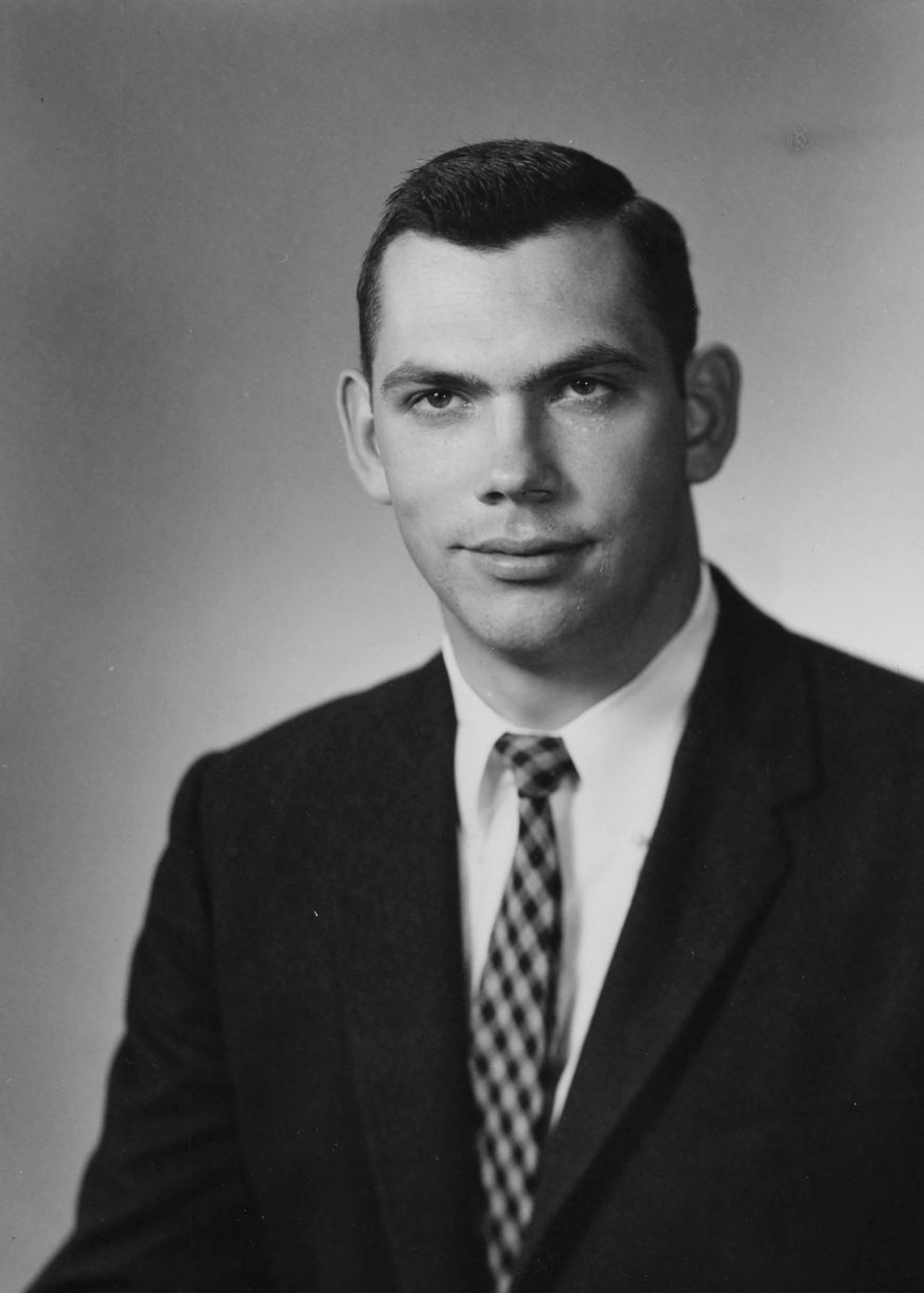 This undated photo provided by North Carolina State University, College of Agriculture and Life Sciences, Communications Services, shows Col. Edgar F. Davis. The remains of the Air Force officer lost for almost 50 years at the height of the U.S. war in Southeast Asia are finally coming home to North Carolina. A container carrying the remains of Davis arrived Thursday, April 5, 2018, at Raleigh-Durham International Airport. His family plans his burial in his native Goldsboro on Friday. (NC State University, College of Agriculture and Life Sciences, Communications Services via AP)
