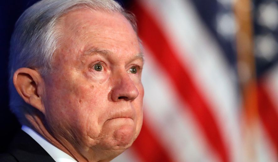 FILE - In this June 20, 2017, file photo, Attorney General Jeff Sessions listens during the Justice Department's National Summit on Crime Reduction and Public Safety, in Bethesda, Md. U.S. Attorney General Sessions has ordered a "zero tolerance" policy aimed at people entering the United States illegally for the first time on the Mexican border. His directive Friday, April 6, 2018, tells federal prosecutors in border states to put more emphasis on charging people with illegal entry, which has historically been treated as a misdemeanor offense for those with few or no previous encounters with border authorities. (AP Photo/Jacquelyn Martin, File)