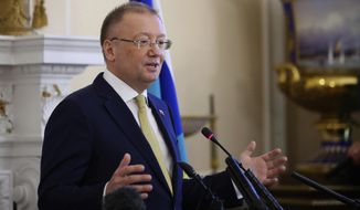 Russian ambassador to the UK Alexander Vladimirovich Yakovenko speaks about the Salisbury incident, during a news conference at the Russian Embassy in London, Thursday April 5, 2018. Britain has blamed Russia for the March 4 poisoning of Sergei Skripal and his daughter. In response, more than two dozen Western allies including Britain, the U.S. and NATO have ordered out over 150 Russian diplomats in a show of solidarity. (Yui Mok/PA via AP)
