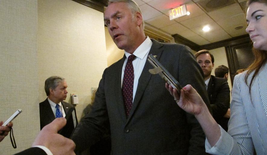 United States Interior Secretary Ryan Zinke speaks at an offshore winds energy forum Friday, April 6, 2018, in Plainsboro, New Jersey. The secretary noted there is "a lot of opposition" on the east and west coasts to President Trump's offshore oil and gas drilling plan, but would not say if he will exempt any state from it. (AP Photo/Wayne Parry)