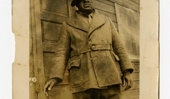 In a photo provided by the Bentley Historical Library, James &amp;quot;Big Jim&amp;quot; Richardson is photographed outside a cabin in Michigan in 1936. The university has acquired a trove of photos capturing a place and time largely overlooked by history: black Civilian Conservation Corps camps during the Great Depression. The photos are the only known images of the state&#39;s segregated, all-black camps. President Franklin Roosevelt established the corps in the early 1930s to employ a &amp;quot;vast army&amp;quot; of unemployed men and restore national resources. (Bentley Historical Library via AP)