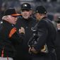 Baltimore Orioles manager Buck Showalter, left, argues with umpires about a call on a rundown involving New York Yankees&#x27; Giancarlo Stanton and Gary Sanchez during the sixth inning of a baseball game Friday, April 6, 2018, in New York. While Showalter argued they were both out on the play, the umpires ruled Stanton out at home and Sanchez safe at third base. (AP Photo/Julie Jacobson)