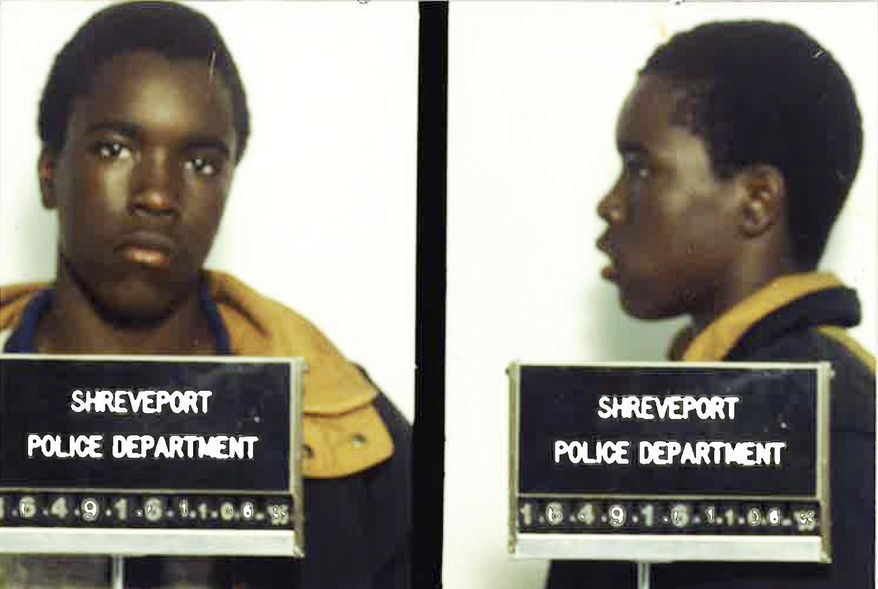 These undated arrest photos made available by the Shreveport Police Department show Corey Williams under arrest. Defense attorneys are urging the nation's highest court to throw out a case in which they claim Louisiana prosecutors withheld evidence that an intellectually disabled 16-year-old boy falsely confessed to killing a pizza deliveryman in 1998. (Shreveport Police Dept. via AP)