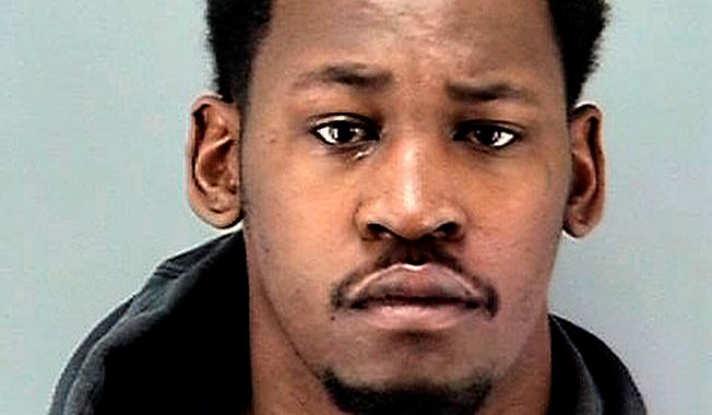 FILE - This booking file photo provided Tuesday, March 6, 2018, by the San Francisco Police Department, shows Aldon Smith. Authorities say former Oakland Raiders and San Francisco 49ers player Smith is back in a California jail after violating a condition of his bail. Online records show the 28-year-old Smith is being held Sunday, April 8, 2018, in San Francisco County Jail on $500,000 bond. (San Francisco Police Department via AP, File)