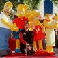 &quot;The Simpsons&quot; creator Matt Groening is joined by the actors portraying the show&#39;s characters in Los Angeles on Friday, Jan. 14, 2000, as the animated series was honored with a star on the Hollywood Walk of Fame. (AP Photo/Chris Pizzello) ** FILE **