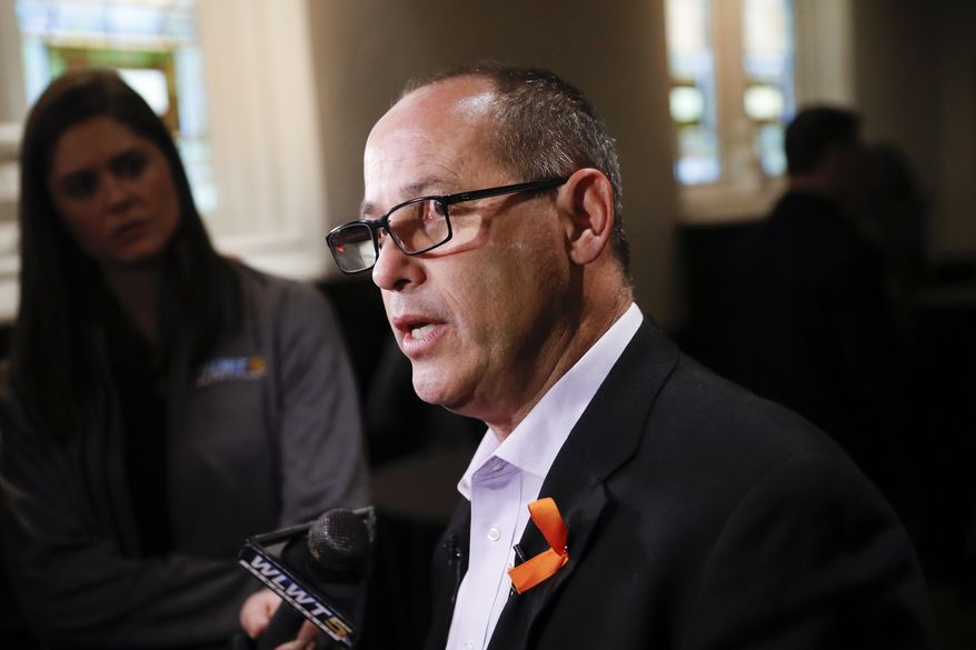 Fred Guttenberg, father of 14-year-old student Jaime who was killed in a mass shooting at Marjory Stoneman High School in Parkland, Fla., speaks to the media at a Hamilton County Young Democrats event to advocate for stronger gun legislation, Monday, April 9, 2018, in Cincinnati. (AP Photo/John Minchillo)