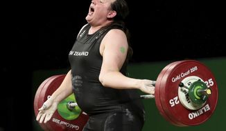 New Zealand&#39;s Laurel Hubbard reacts after failing to make a lift in the snatch of the women&#39;s +90kg weightlifting final at the 2018 Commonwealth Games on the Gold Coast, Australia, Monday, April 9, 2018. (AP Photo/Mark Schiefelbein)