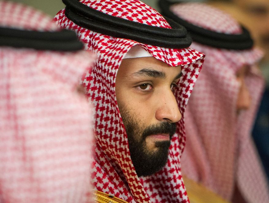 FILE - In this March 22, 2018, file photo, Saudi Crown Prince Mohammed bin Salman meets with U.S. Defense Secretary Jim Mattis at the Pentagon in Washington. Prince Mohammed is making his first official visit to France, which is hoping to profit from his shake-up of the conservative kingdom. French media reports say the prince arrives Sunday, April 8, 2018. (AP Photo/Cliff Owen, File)