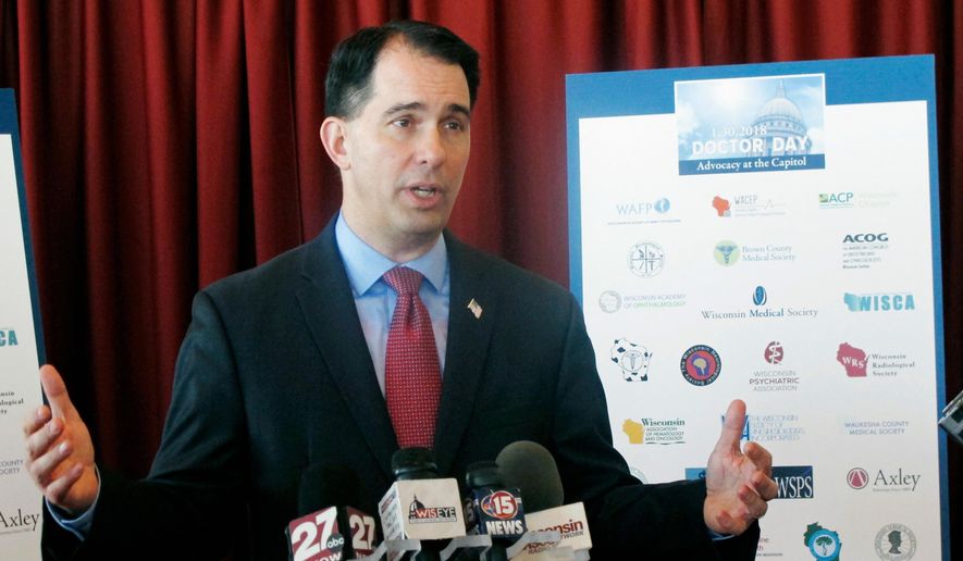 In this Jan. 30, 2018, file photo, Wisconsin Gov. Scott Walker speaks at a news conference in Madison, Wis. (AP Photo/Scott Bauer, File) ** FILE **