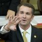 Virginia Gov. Ralph Northam waves to the gallery as he prepares to deliver his State of the Commonwealth address before a joint session of the Virginia General Assembly at the Capitol in Richmond, Va., Monday, Jan. 15, 2018. (AP Photo/Steve Helber) ** FILE **