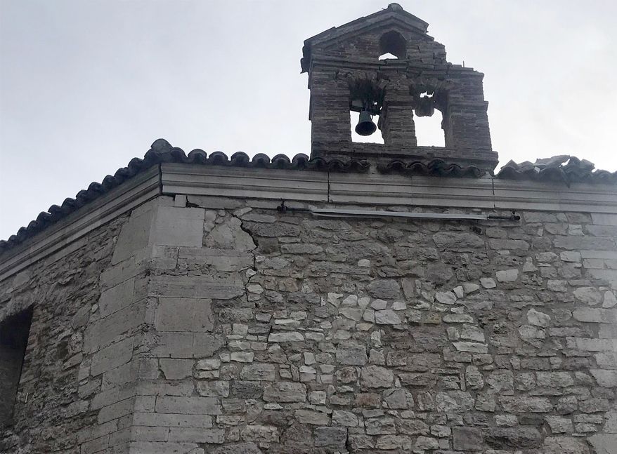 A view of a damaged bell tower of the 17th century Santa Maria di Varano' church after an earthquake, in Muccia, near Macerata, central Italy, April 10, 2018. A 4.7-magnitude quake shook residents and structures early Tuesday in a region of central Italy that had been struck by a series of powerful quakes in 2016, no deaths or injuries have been reported. (Gianluigi Basilietti/ANSA via AP)