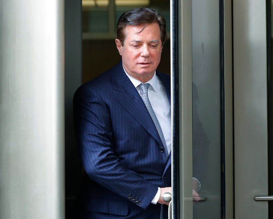 FILE - In this Feb. 14, 2018, file photo, Paul Manafort, President Donald Trump's former campaign chairman, leaves the federal courthouse in Washington. New documents reveal that Special Counsel Robert Mueller may be trying to use his investigation of Manafort to probe deeper into the Trump campaign. (AP Photo/Pablo Martinez Monsivais, File)
