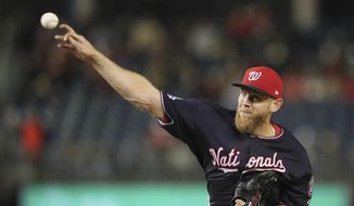 Washington Nationals starting pitcher Stephen Strasburg (37) throws against the Atlanta Braves during the fifth inning of a baseball game at Nationals Park, Tuesday, April 10, 2018 in Washington. (AP Photo/Pablo Martinez Monsivais)