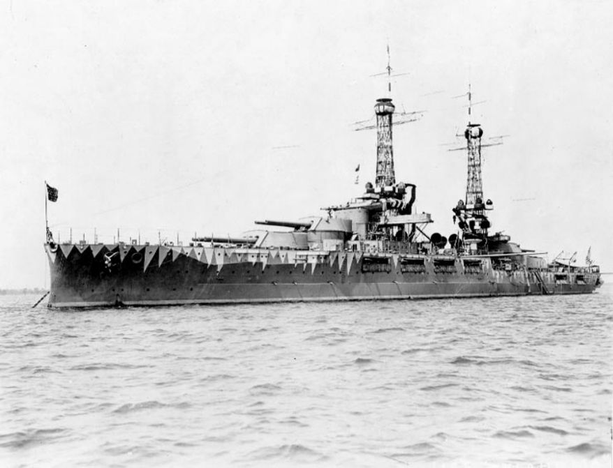 The USS Oklahoma wearing experimental cmouflage, circa 1917, in this U.S. Navy photograph in the public domain, accessed via Wikimedia Commons. The AP reported on April 10, 2018, that Glenn Tipton, a sailor who perished aboard the Oklahoma during the December 7, 1941 attack on Pearl Harbor has been positively identified via DNA samples of relatives. (Wikimedia Commons)