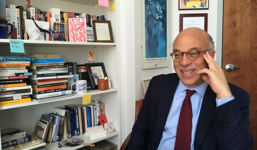 David Dodson, president of North Carolina Manpower Development Corporation, a nonprofit group, smiles at his office after presenting the findings of MDC's State of the South 2018 report in Durham, NC., Tuesday, April 10, 2018. Among the report's findings was that the South's increasingly diverse homegrown talent pool won't share in the region's economic growth unless leaders in the 13 southern recommit to spending on public schools and higher education. (AP Photo/Jonathan Drew)