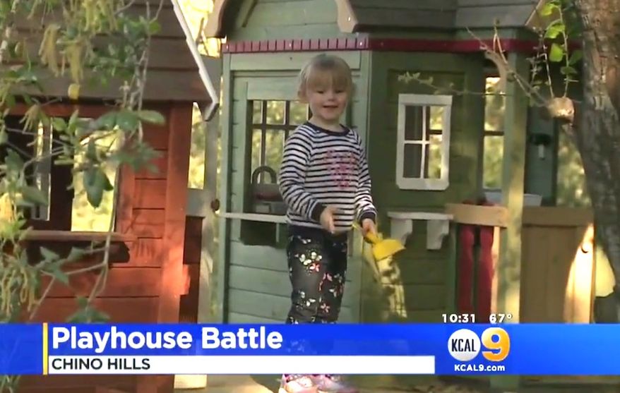 Zoe Adomeit, 3, walks outside a playhouse built by her father in Chino Hills, California. (Image: KCAL CBS-9 California screenshot)