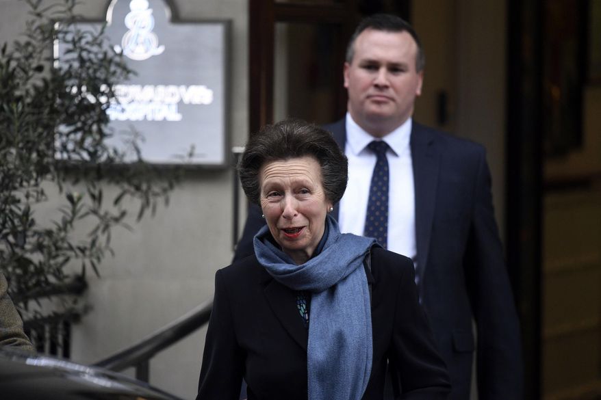 Britain's Princess Anne leaves the King Edward VII Hospital in London, Thursday, April 12, 2018. Princess Anne has visited her father Prince Philip in the hospital where he is recovering from hip replacement surgery. She visited 96-year-old Philip at King Edward VII Hospital for 50 minutes in central London Thursday afternoon and said afterward he is “on good form.” (Victoria Jones/PA via AP)