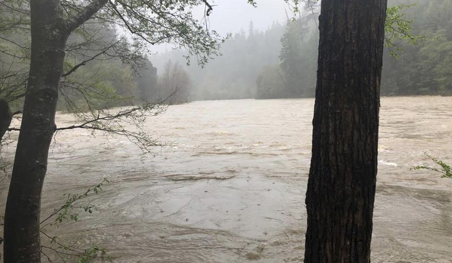 In this photo released Thursday, April 12, 2018, by The Mendocino County Sheriff's Office is the Eel River in Northern California. The Mendocino County Sheriff's Office says recovered debris and personal items confirm that a vehicle seen plunging into a storm-swollen river last week belonged to a family that went missing. A sheriff's office statement Thursday, April 12, 2018, says the vehicle and its occupants haven't been located in the Eel River but searchers have found numerous items from the vehicle's body and interior. They say the items are consistent with a family on vacation and unspecified items were identified by relatives of the Thottapilly family. (Lt. Shannon Barney/Mendocino County Sheriff's Office via AP)