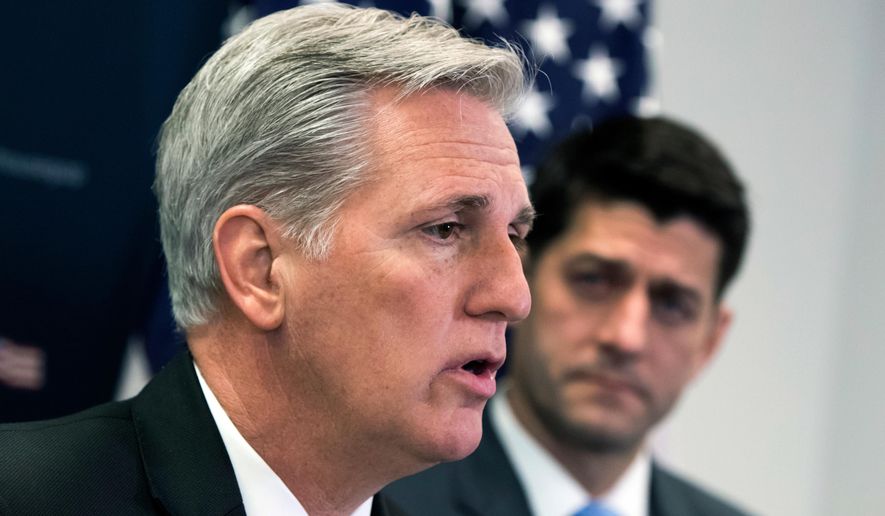 In this Feb. 6, 2018, file photo, House Majority Leader Kevin McCarthy, R-Calif., joined at right by Speaker of the House Paul Ryan, R-Wis., talks with reporters at the Capitol in Washington. (AP Photo/J. Scott Applewhite, File)
