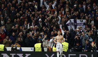 Real Madrid&#x27;s Cristiano Ronaldo celebrates at the end of a Champions League quarter final second leg soccer match between Real Madrid and Juventus at the Santiago Bernabeu stadium in Madrid, Wednesday, April 11, 2018. (AP Photo/Francisco Seco)
