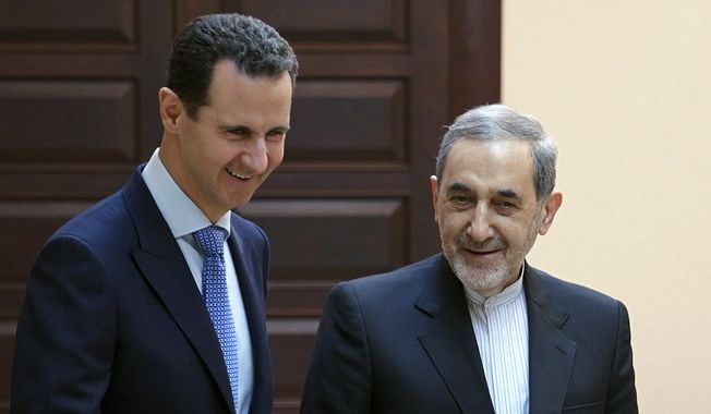 Syrian President Bashar Assad met Thursday in Damascus with Ali Akbar Velayati, an adviser to Iran&#x27;s supreme leader, Ayatollah Ali Khamenei. (Associated Press)